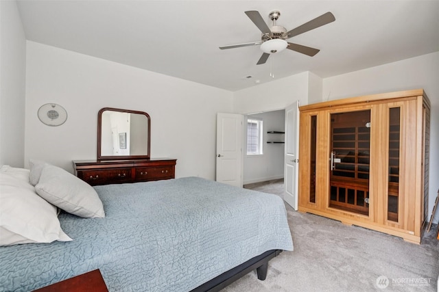 8665 Kimmie Loop SW, Tumwater, WA 98512 - carpeted bedroom with ceiling fan and baseboards