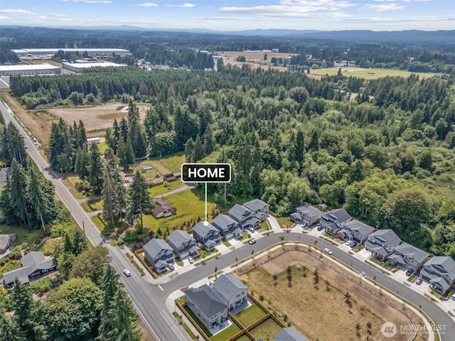 8665 Kimmie Loop SW, Tumwater, WA 98512 - view of property location featuring a forest and nearby suburban area