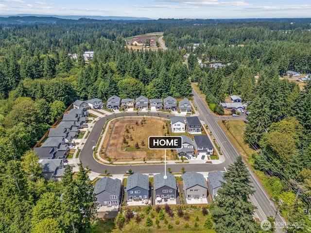 8665 Kimmie Loop SW, Tumwater, WA 98512 - aerial view of property and surrounding area featuring nearby suburban area