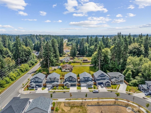 8665 Kimmie Loop SW, Tumwater, WA 98512 - aerial view of residential area with a forest
