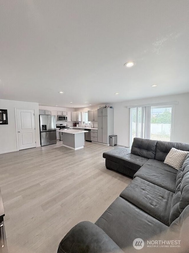 1344 Theo Way, Rock Island, WA 98850 - living area featuring light wood finished floors and recessed lighting