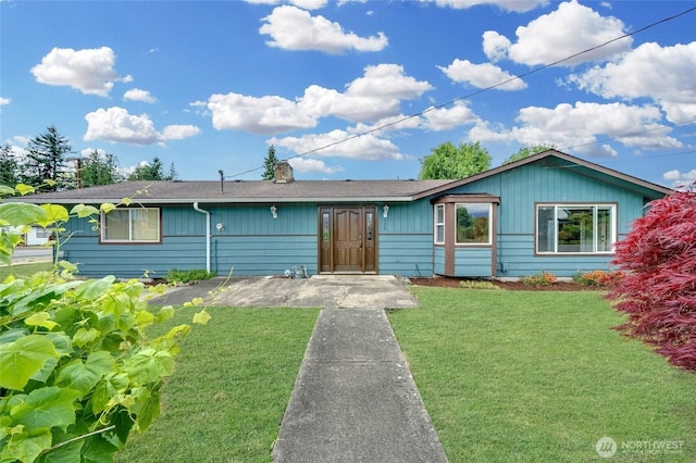 120 E Mason Ave, Buckley, WA 98321 - single story home with a front yard, a chimney, and roof with shingles