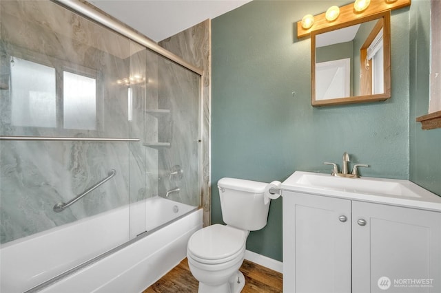 120 E Mason Ave, Buckley, WA 98321 - full bathroom with bath / shower combo with glass door, vanity, and wood finished floors