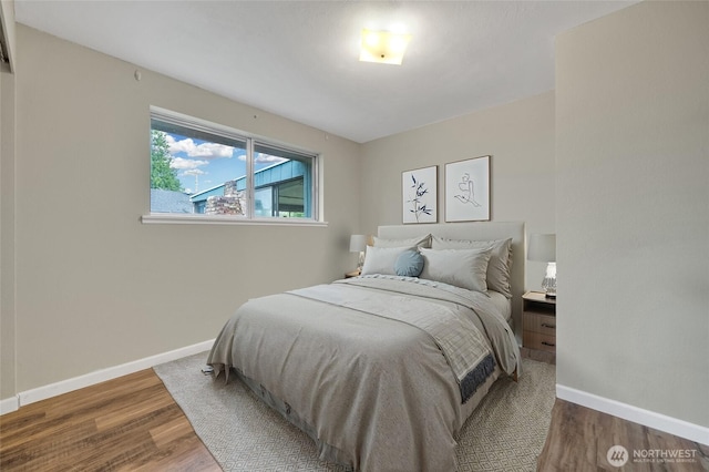 120 E Mason Ave, Buckley, WA 98321 - bedroom featuring baseboards and wood finished floors