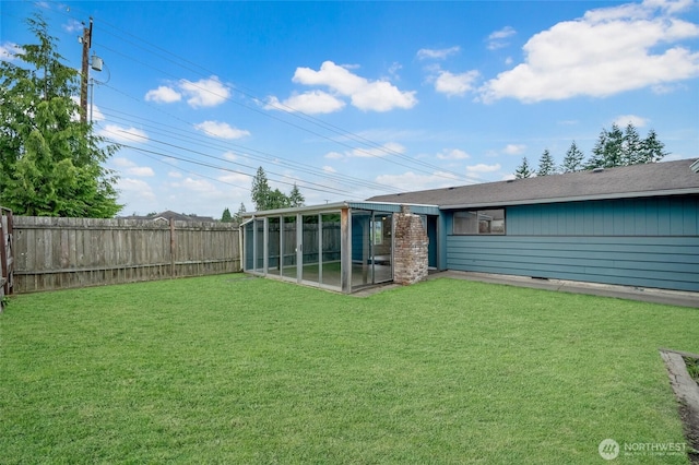 120 E Mason Ave, Buckley, WA 98321 - fenced backyard featuring a sunroom