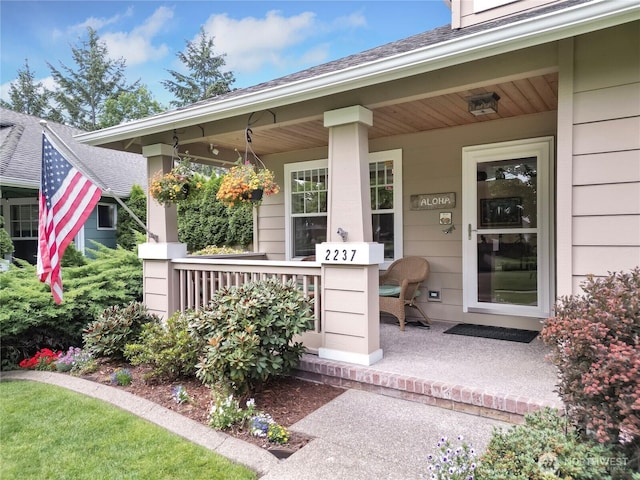 2237 Mcdonald Ave, Dupont, WA 98327 - doorway to property with covered porch and a shingled roof