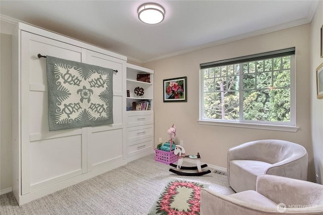 2237 Mcdonald Ave, Dupont, WA 98327 - sitting room with carpet floors, crown molding, and healthy amount of natural light
