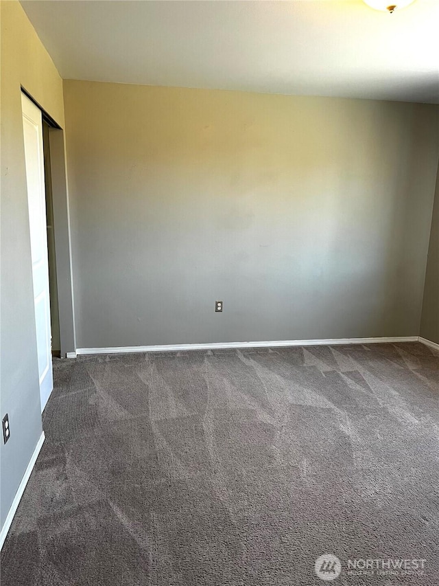 1042 S Lakeland Dr, Moses Lake, WA 98837 - unfurnished room featuring carpet flooring and baseboards
