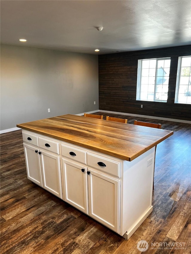 1042 S Lakeland Dr, Moses Lake, WA 98837 - kitchen featuring wooden counters, dark wood-type flooring, white cabinetry, open floor plan, and recessed lighting