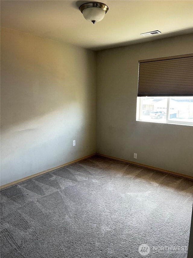 1042 S Lakeland Dr, Moses Lake, WA 98837 - unfurnished room featuring carpet and baseboards