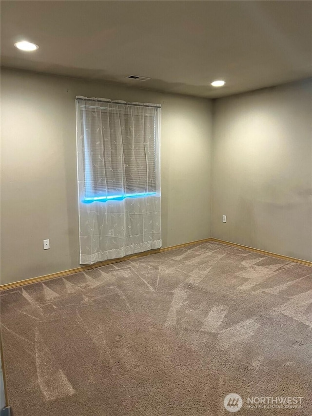 1042 S Lakeland Dr, Moses Lake, WA 98837 - spare room with recessed lighting and carpet