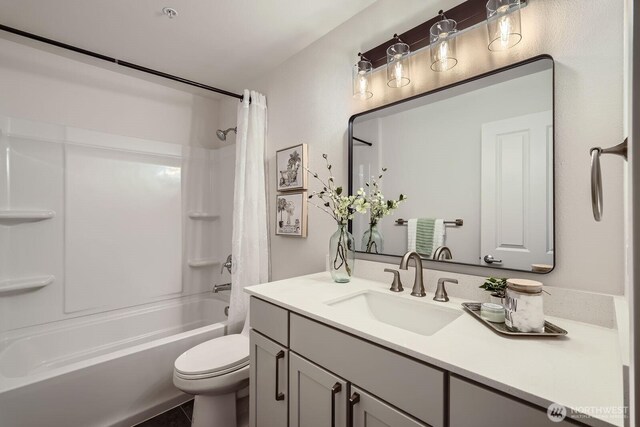 5589 Lakemont Blvd SE Unit 1703, Bellevue, WA 98006 - full bath with vanity, shower / tub combo, and tile patterned flooring