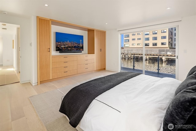 2241 Fairview Ave E Unit B, Seattle, WA 98102 - bedroom with light wood-style floors, recessed lighting, and access to outside