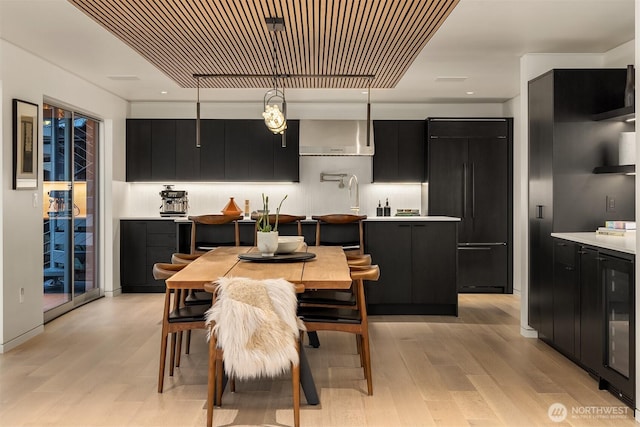 2241 Fairview Ave E Unit B, Seattle, WA 98102 - dining area with light wood finished floors and wine cooler