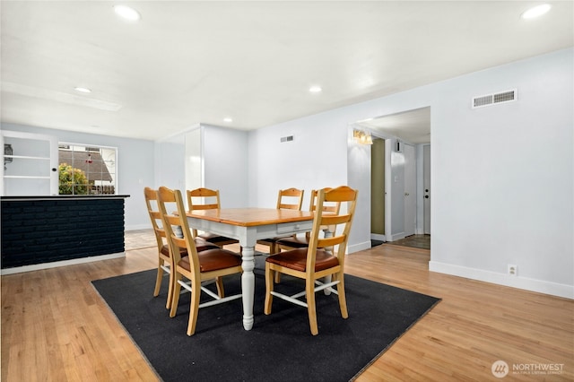 1037 Harding St, Enumclaw, WA 98022 - dining space featuring light wood-style flooring and recessed lighting