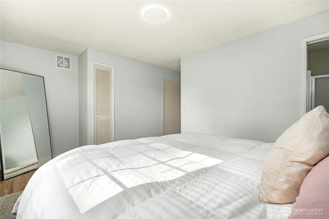 1037 Harding St, Enumclaw, WA 98022 - bedroom featuring a closet and wood finished floors