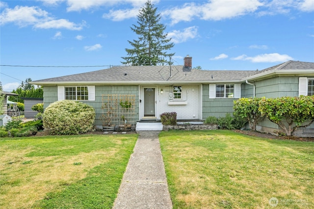 1037 Harding St, Enumclaw, WA 98022 - ranch-style house featuring a chimney, a front lawn, and roof with shingles