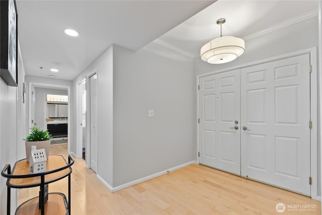 177 NE 107th Ave Unit 1601, Bellevue, WA 98004 - foyer entrance featuring light wood-style flooring, crown molding, and recessed lighting