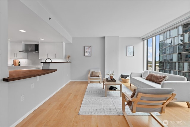 177 NE 107th Ave Unit 1601, Bellevue, WA 98004 - living area featuring light wood-type flooring and recessed lighting