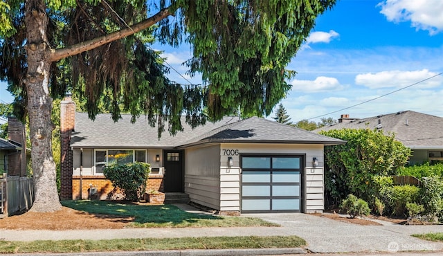 7006 20th Ave NE, Seattle, WA 98115 - single story home with an attached garage, a shingled roof, driveway, a chimney, and brick siding