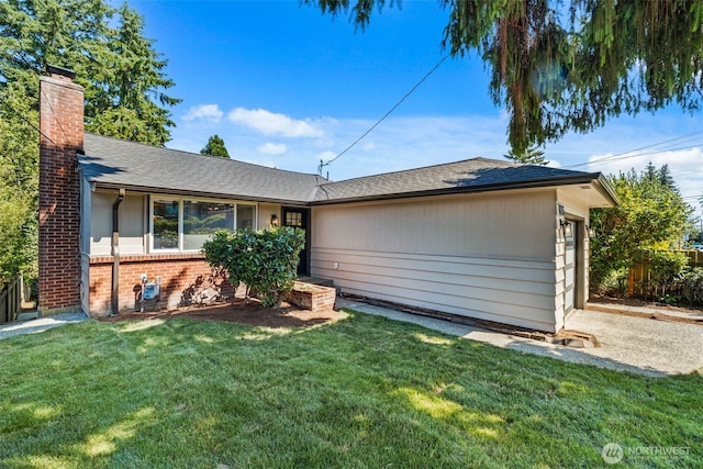 7006 20th Ave NE, Seattle, WA 98115 - ranch-style house with brick siding, a chimney, a front lawn, and roof with shingles