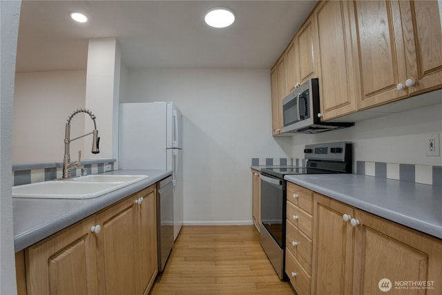 2969 142nd Pl SE # 8, Bellevue, WA 98007 - kitchen featuring stainless steel appliances, light wood-type flooring, and recessed lighting
