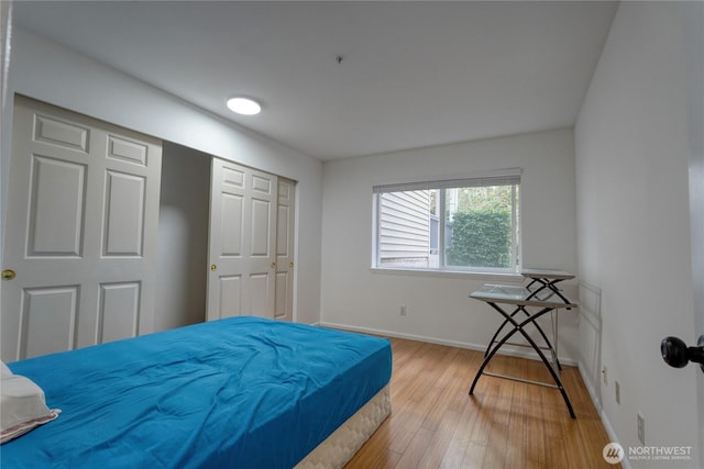 2969 142nd Pl SE # 8, Bellevue, WA 98007 - bedroom featuring light wood-type flooring and baseboards
