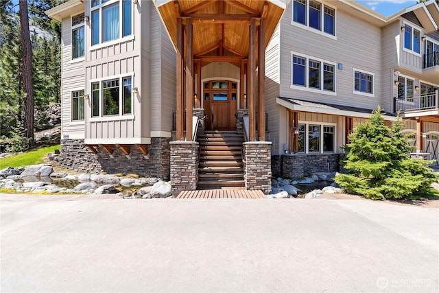 6730 Forest Ridge Dr, Wenatchee, WA 98801 - view of front of house featuring stone siding and board and batten siding