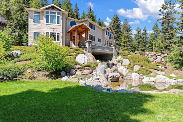 6730 Forest Ridge Dr, Wenatchee, WA 98801 - rear view of house featuring a yard