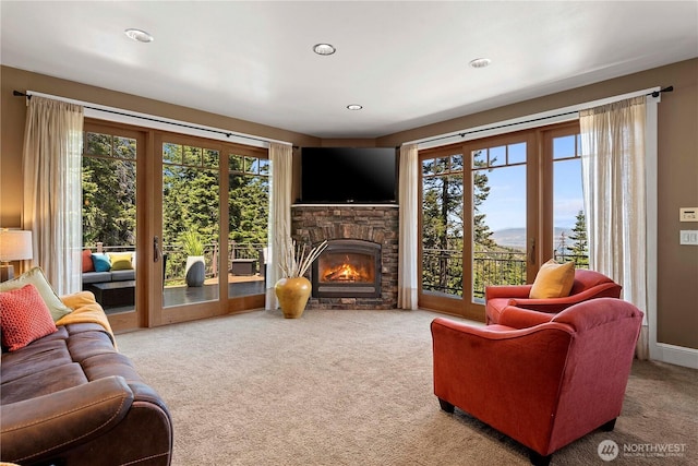 6730 Forest Ridge Dr, Wenatchee, WA 98801 - carpeted living area with a fireplace, french doors, and recessed lighting
