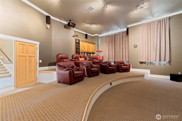 6730 Forest Ridge Dr, Wenatchee, WA 98801 - carpeted home theater featuring crown molding and rail lighting