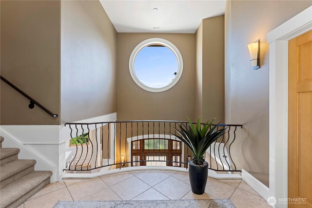 6730 Forest Ridge Dr, Wenatchee, WA 98801 - stairway with tile patterned floors and baseboards