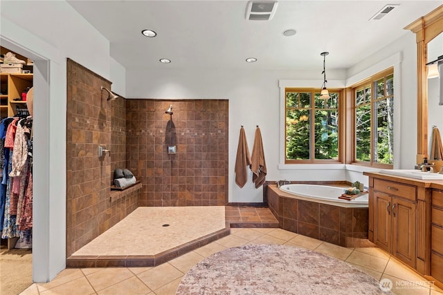 6730 Forest Ridge Dr, Wenatchee, WA 98801 - full bath with a garden tub, tile patterned floors, vanity, a tile shower, and recessed lighting