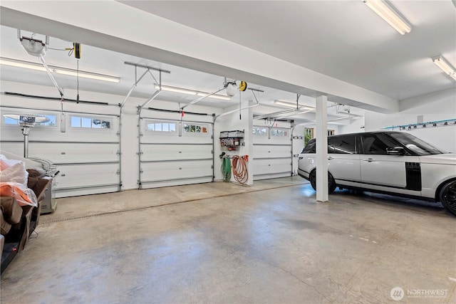6730 Forest Ridge Dr, Wenatchee, WA 98801 - garage featuring a garage door opener