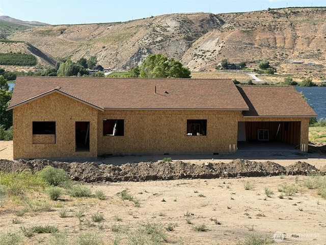 30 Chambers Rd, Brewster, WA 98812 - view of front facade featuring a mountain view and a shingled roof