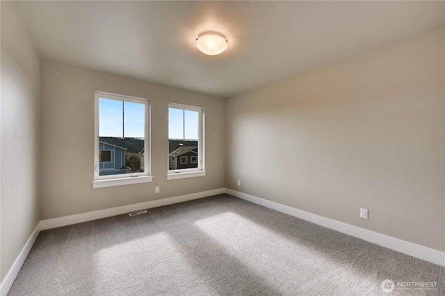 26517 NE 147th Pl Unit Sr 13, Duvall, WA 98019 - empty room featuring carpet floors and baseboards