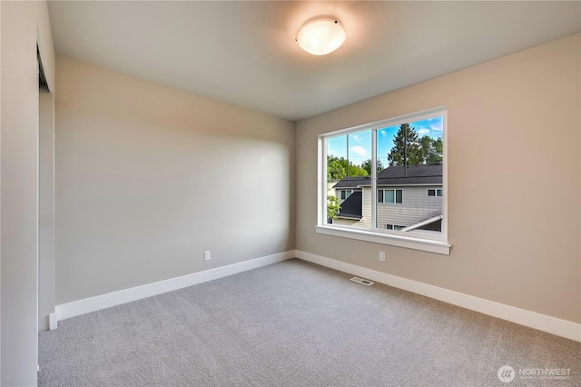 26517 NE 147th Pl Unit Sr 13, Duvall, WA 98019 - carpeted empty room featuring baseboards