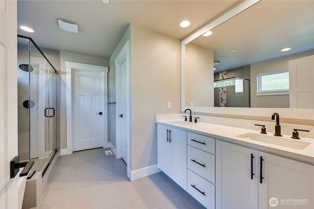26517 NE 147th Pl Unit Sr 13, Duvall, WA 98019 - full bath featuring a stall shower, double vanity, tile patterned flooring, and recessed lighting