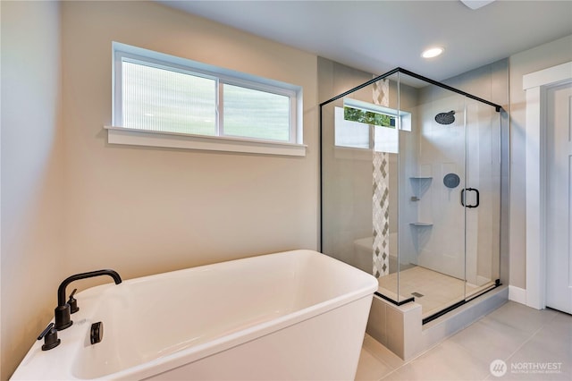 26517 NE 147th Pl Unit Sr 13, Duvall, WA 98019 - full bathroom with a freestanding bath, a shower stall, tile patterned floors, and recessed lighting
