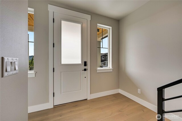 26517 NE 147th Pl Unit Sr 13, Duvall, WA 98019 - foyer entrance featuring light wood finished floors and healthy amount of natural light
