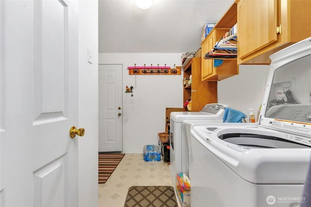 523 N 7th Ave, Sequim, WA 98382 - washroom with cabinet space, independent washer and dryer, and tile patterned floors