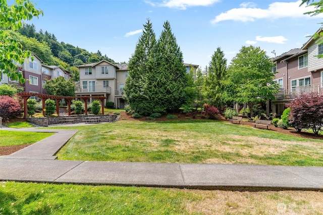 15325 SE 155th Pl Unit N-2, Renton, WA 98058 - view of grassy yard featuring a pergola and a residential view