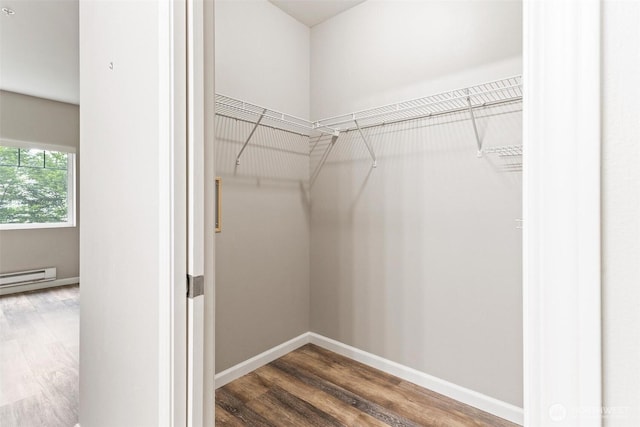 15325 SE 155th Pl Unit N-2, Renton, WA 98058 - walk in closet with wood finished floors and baseboard heating