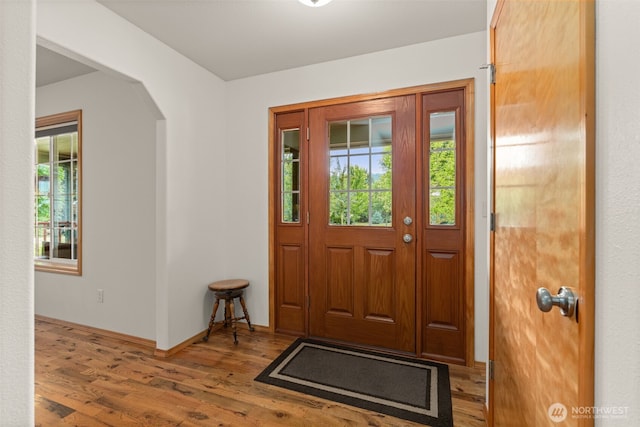 25901 NE 412th Cir, Amboy, WA 98601 - foyer with plenty of natural light, arched walkways, and wood finished floors