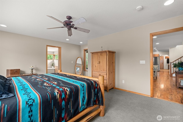 25901 NE 412th Cir, Amboy, WA 98601 - carpeted bedroom featuring recessed lighting, freestanding refrigerator, ceiling fan, and ensuite bath