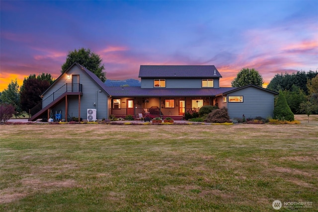 25901 NE 412th Cir, Amboy, WA 98601 - view of front of house with a lawn, covered porch, and stairway