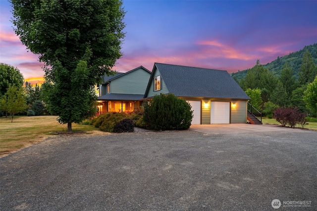 25901 NE 412th Cir, Amboy, WA 98601 - view of front facade featuring an attached garage, driveway, and a shingled roof