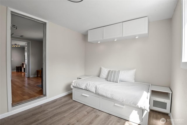 1580 134th Ln, Long Beach, WA 98631 - bedroom featuring wood finished floors and baseboards