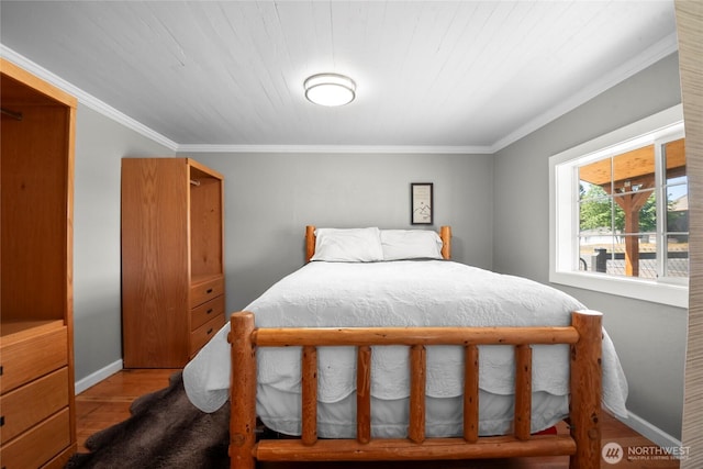 1580 134th Ln, Long Beach, WA 98631 - bedroom with wood finished floors and crown molding
