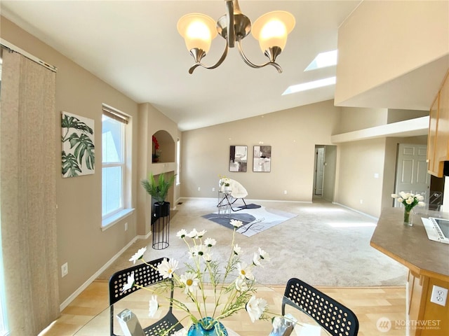 2218 143rd Street Ct S, Spanaway, WA 98387 - living area with a chandelier, light colored carpet, and vaulted ceiling